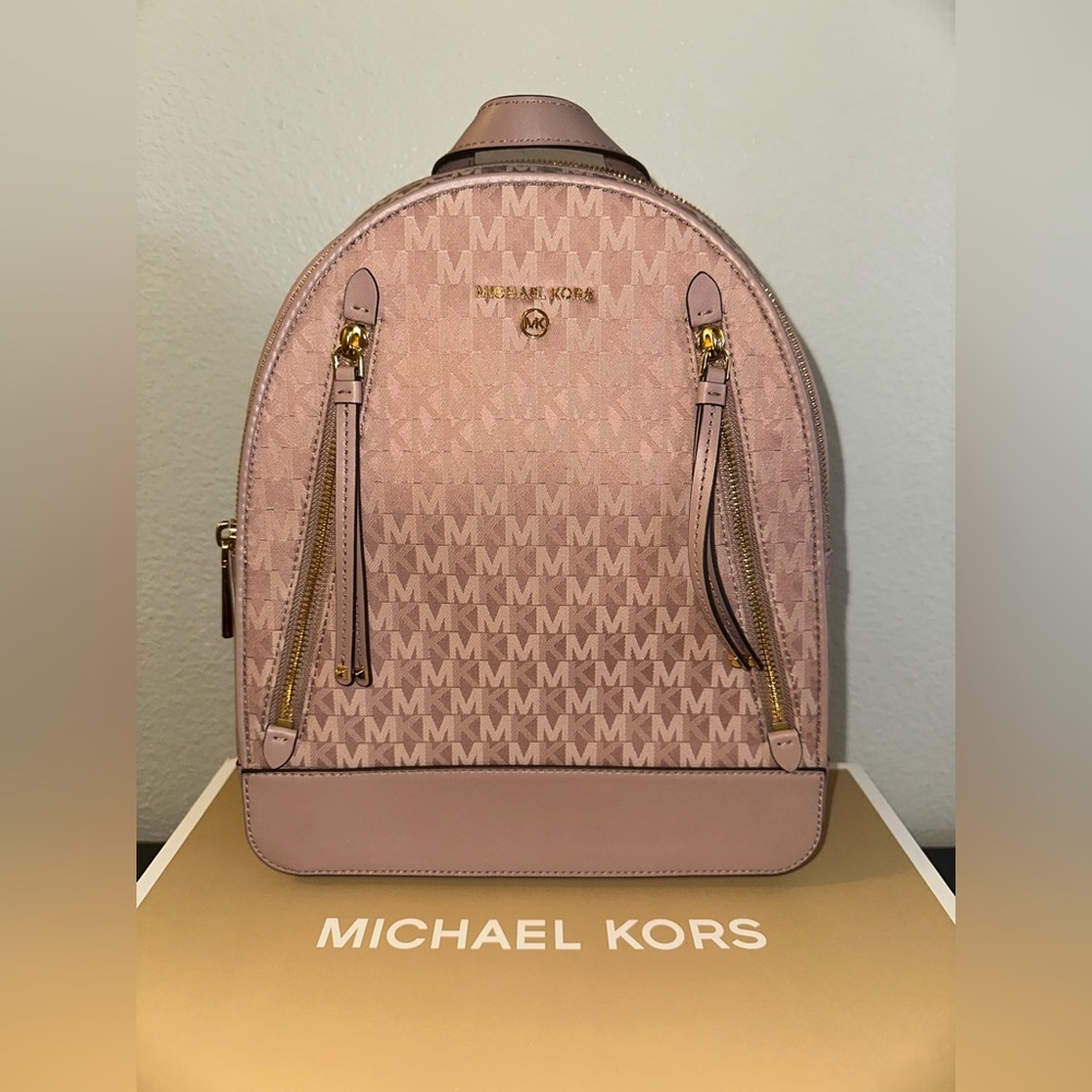 SOLD
Michael Kors Blush Monogram Backpack